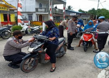 Polsek Moro dan Koramil 02 Moro Himbauan Kibarkan Bendera Merah Putih