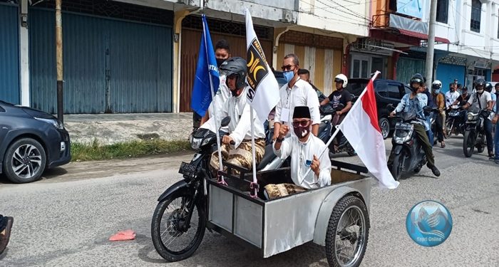 Ing Iskandar – Anwar Abu Bakar Naik Motor Becak Menuju KPU, Ini Sosok Pilihan Rakyat