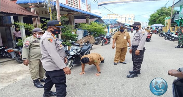 Tidak Gunakan Masker Oknum PNS Moro Dapat Hukuman Push Up