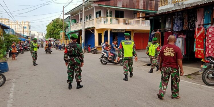 Guna Memutus Mata Rantai Penyebaran Covid 19, Koramil 02 Moro lakukan Razia Yusitisi Masker