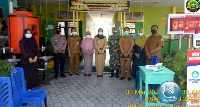 Babinsa Pantau kegiatan Rapat Koordinasi Penanganan Virus Covid 19 