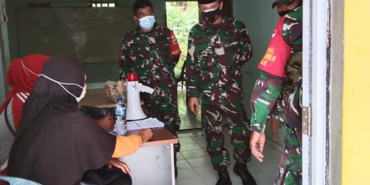 Gurindam 12 Kodim 0317 TBK Koramil 02 Moro Lakukan Vaksinasi di Desa Paoh, Targetkan 150 Orang Divaksinasi Sinovac