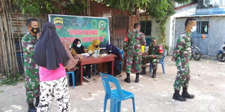 Serbuan Vaksinasi Gurindam 12 Kodim 0317 Moro Laksanakan Vaksinasi Serentak Dosis Pertama dan Kedua di Moro