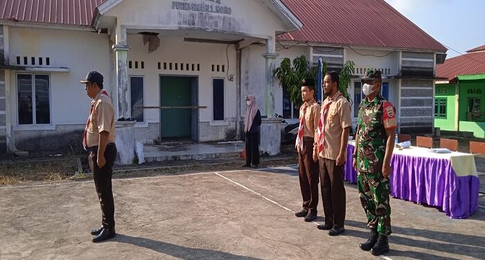 Koramil 02 Moro Kodim 0317 TBK Hadir Dalam Pelantikan Bantara Pramuka SMAN 1 Moro