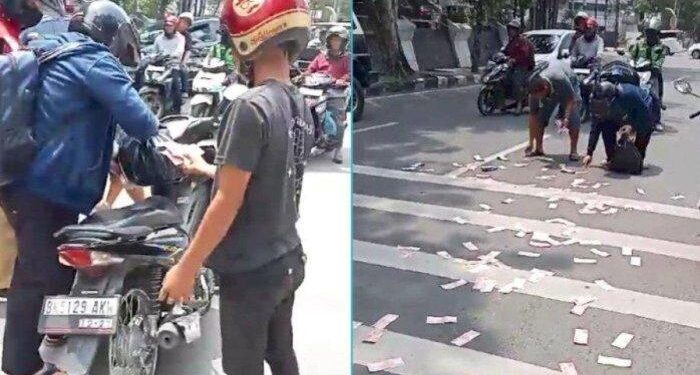 Video Viral Uang Pecahan Rp 100 Ribu Berserakan di Jalanan Kota Medan