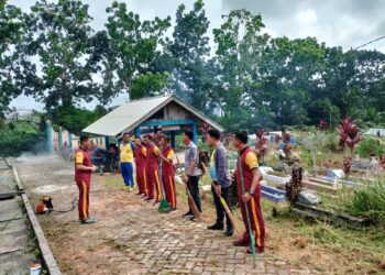 Polsek Gunung Kijang Goro di TPU Bukit Abadi Kawal